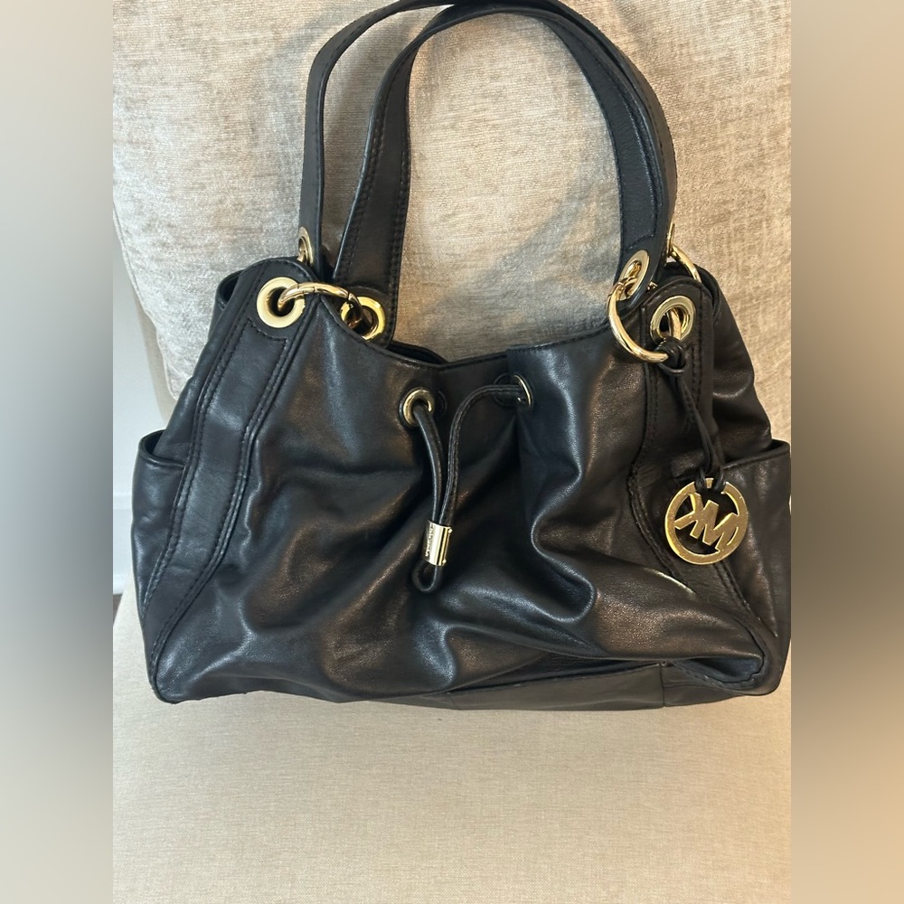 Black leather Michael Kors hobo handbag